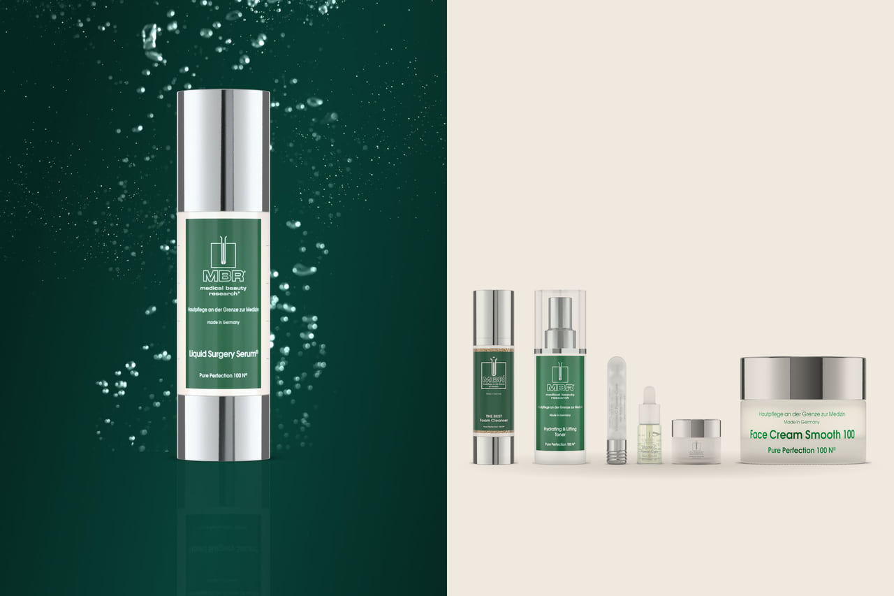 Left, an MBR serum bottle in a spray of water droplets on a deep green ground; right, the MBR foam cleanser, toner, Vitamin C Power Cure set and face cream on a warm stone ground.
